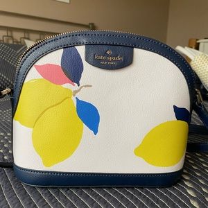 Like new Kate Spade purse with lemons.